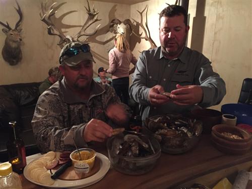 Craig and Jarrett enjoying fresh mussels in the man cave